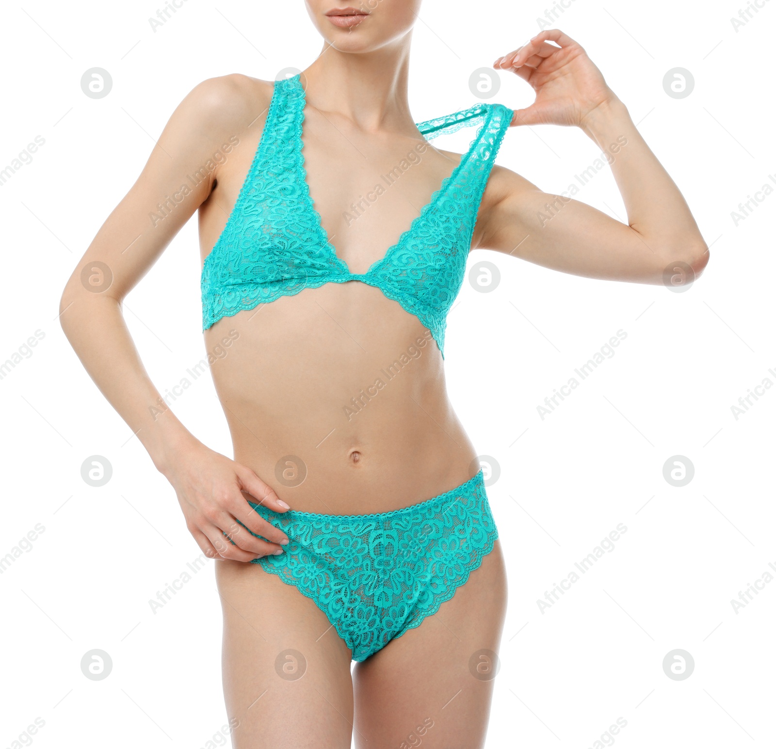 Woman wearing beautiful underwear on white background, closeup Photo of Woman wearing beautiful underwear on white background, closeup
