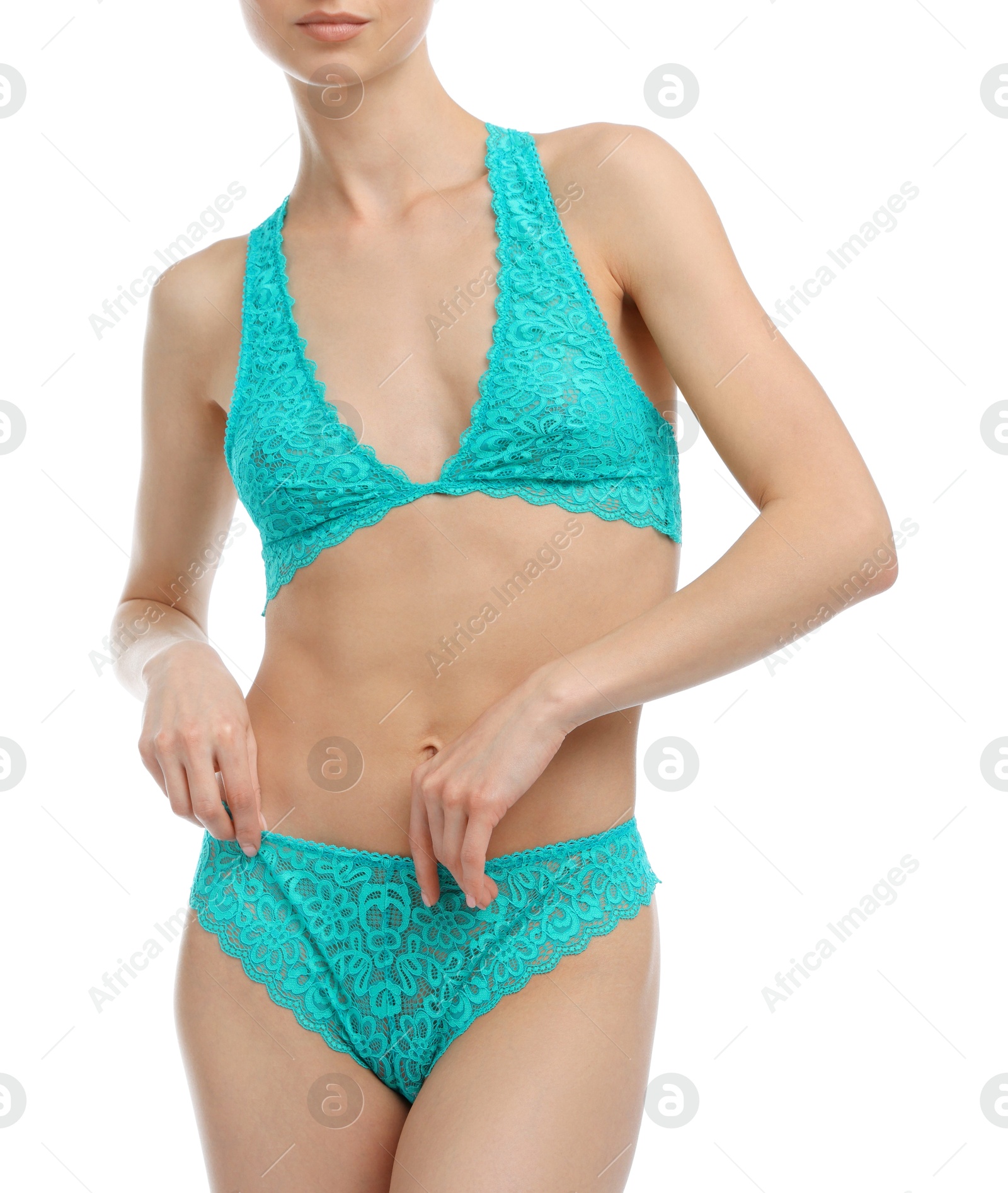 Woman wearing beautiful underwear on white background, closeup Photo of Woman wearing beautiful underwear on white background, closeup