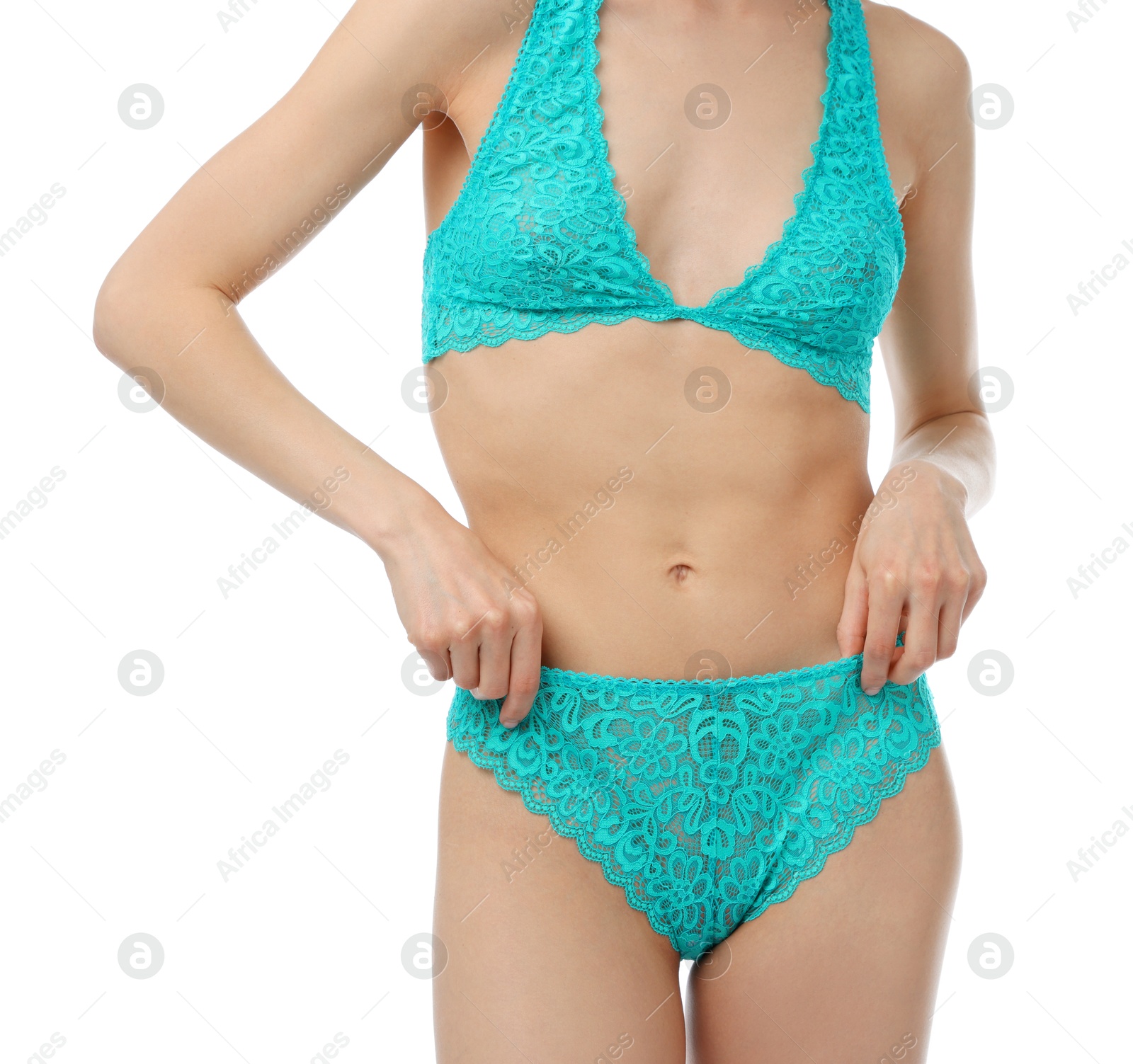 Woman wearing beautiful underwear on white background, closeup Photo of Woman wearing beautiful underwear on white background, closeup