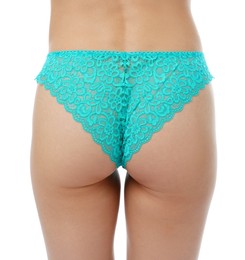 Photo of Woman wearing beautiful underwear on white background, closeup