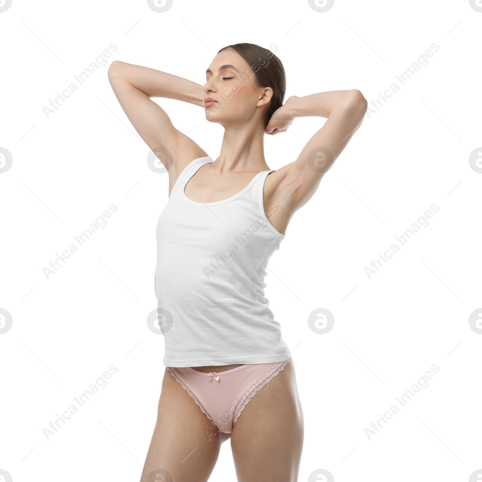 Woman wearing beautiful underwear on white background Photo of Woman wearing beautiful underwear on white background