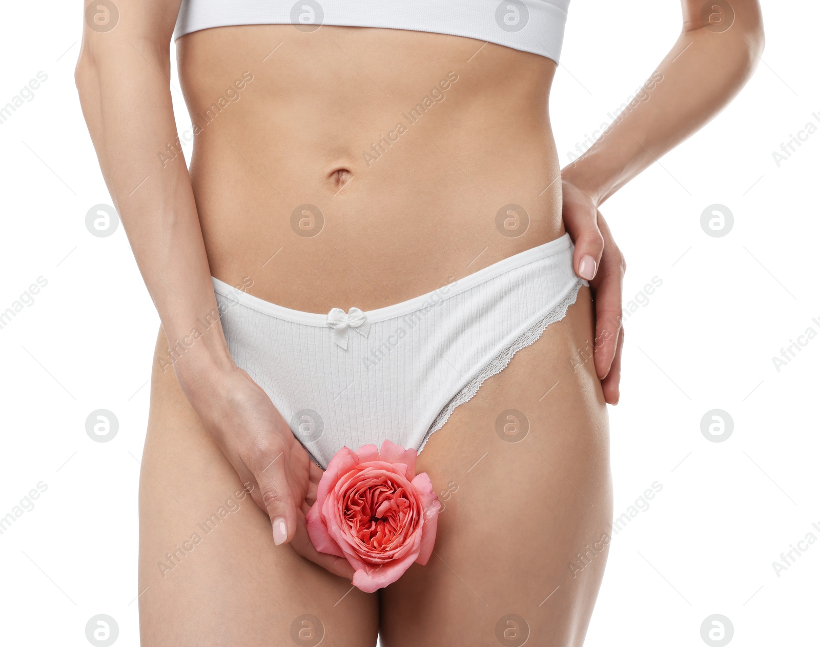 Woman with flower wearing beautiful underwear on white background, closeup Photo of Woman with flower wearing beautiful underwear on white background, closeup