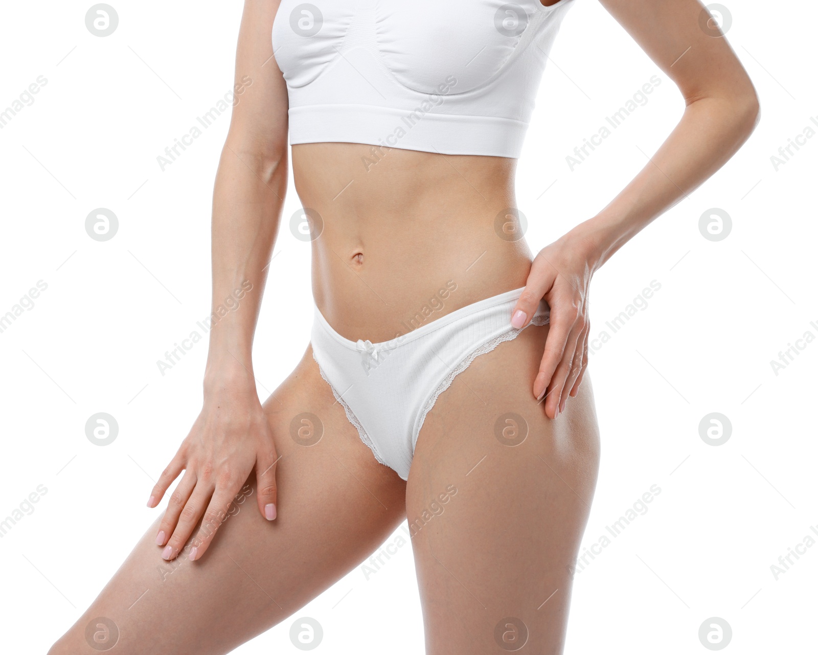 Woman wearing beautiful underwear on white background, closeup Photo of Woman wearing beautiful underwear on white background, closeup