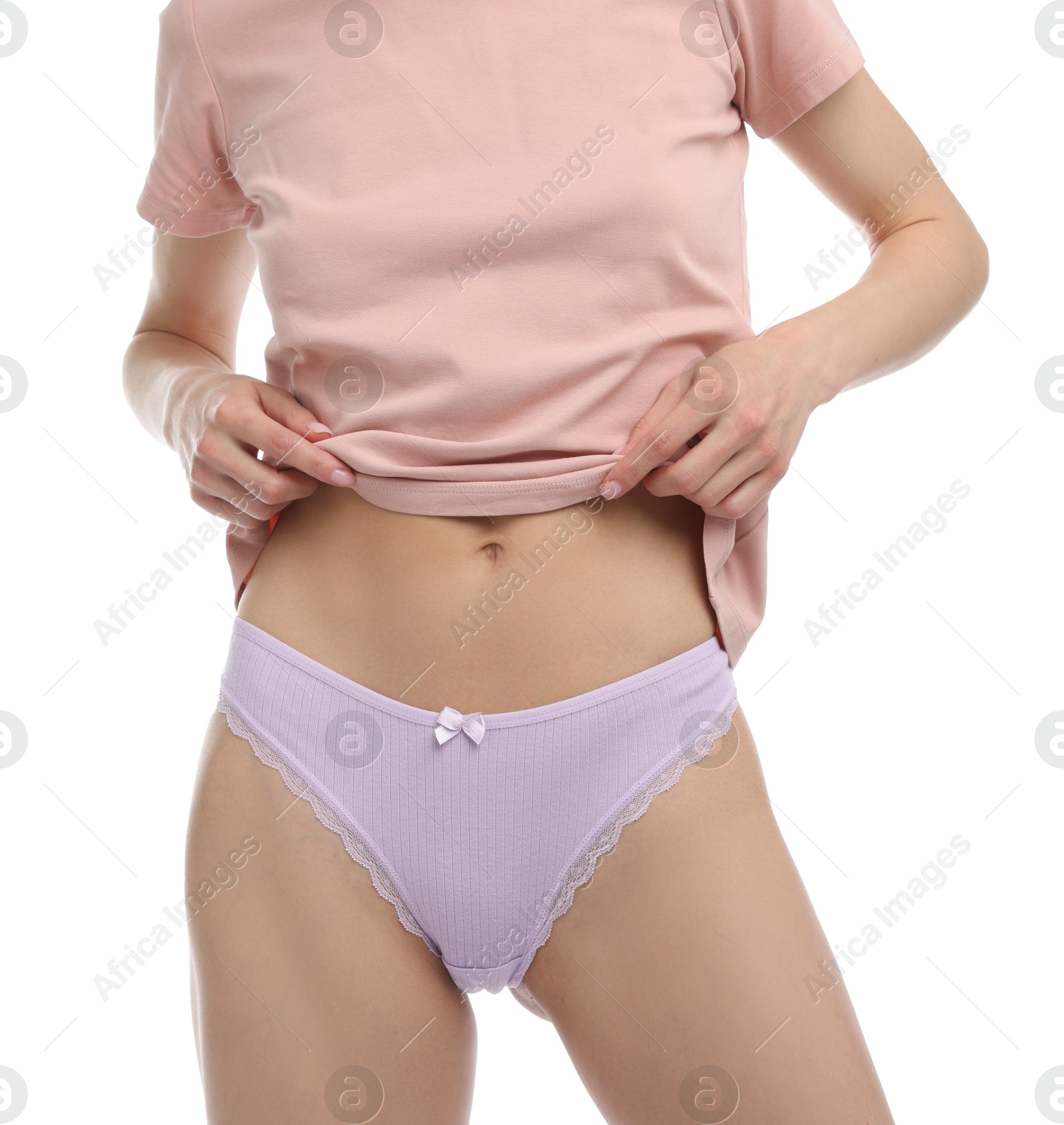 Woman wearing beautiful underwear on white background, closeup Photo of Woman wearing beautiful underwear on white background, closeup