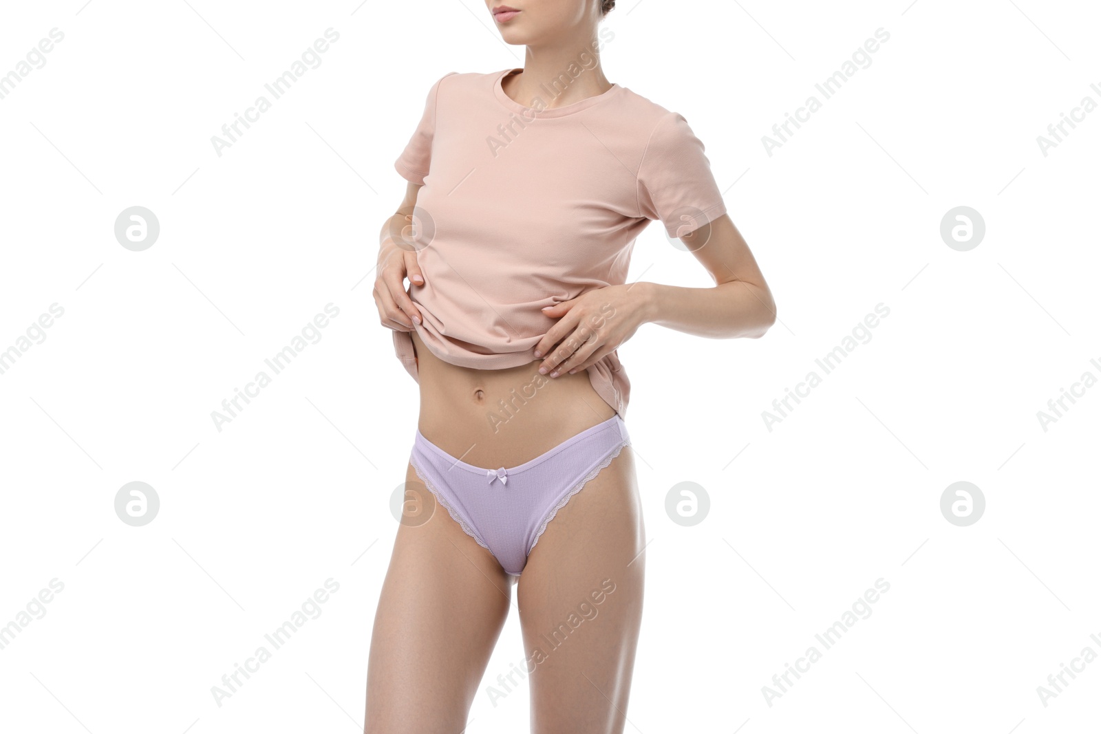 Woman wearing beautiful underwear on white background, closeup Photo of Woman wearing beautiful underwear on white background, closeup