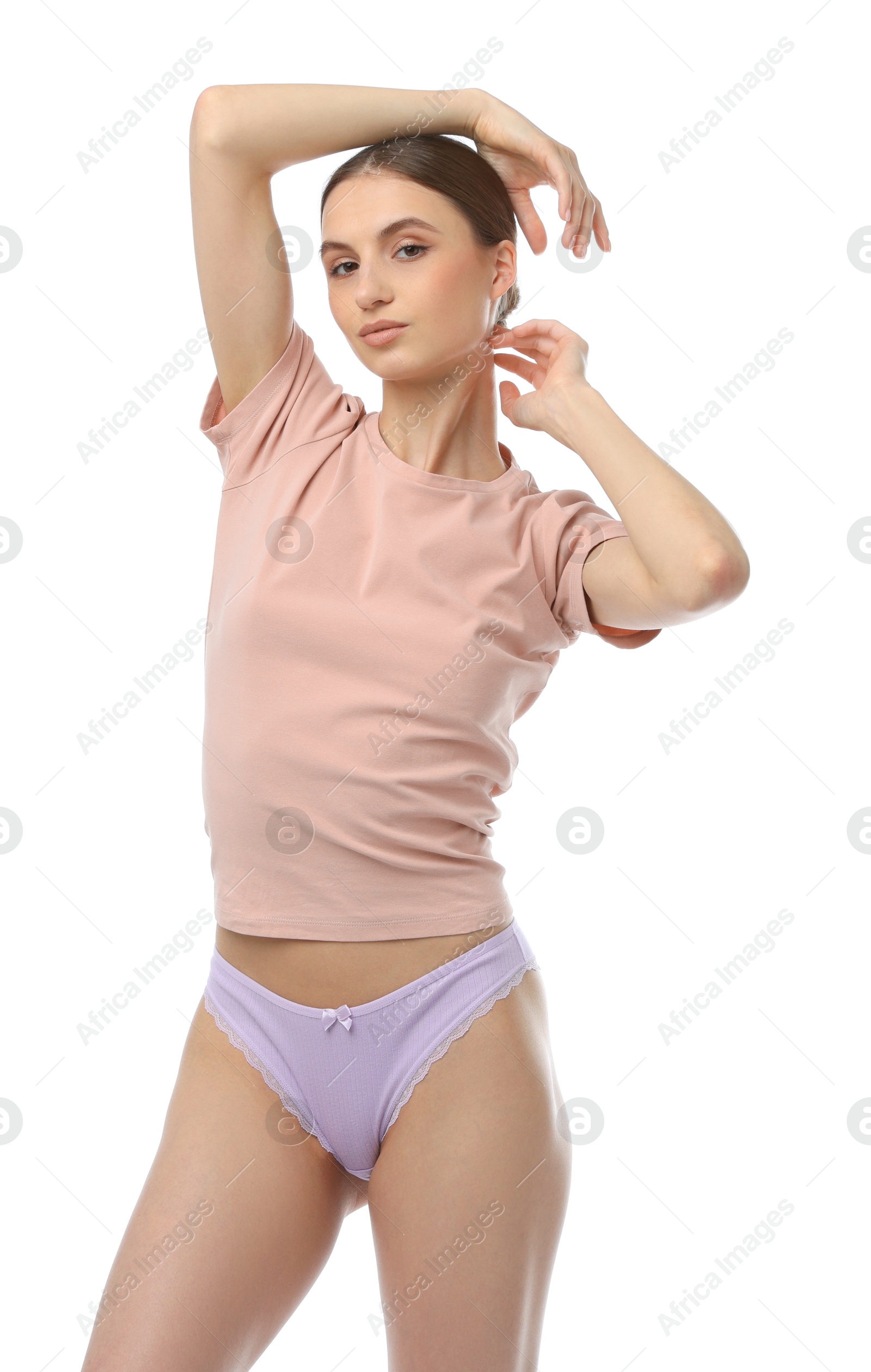 Woman wearing beautiful underwear on white background Photo of Woman wearing beautiful underwear on white background