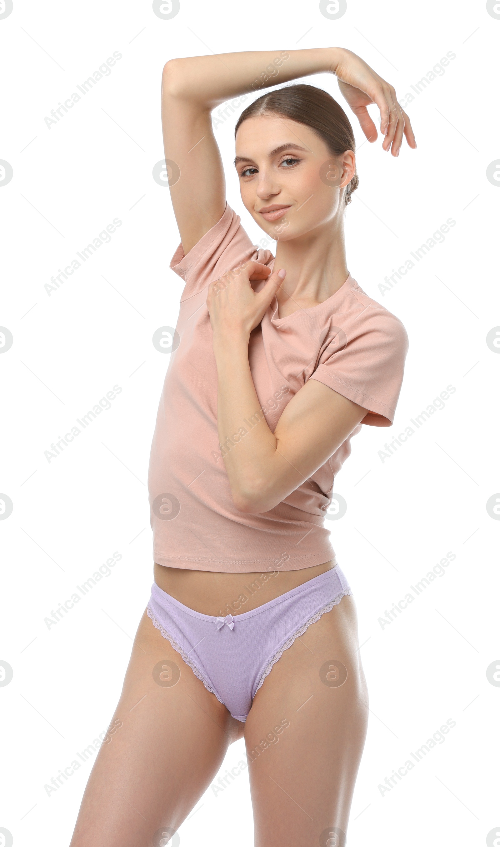 Woman wearing beautiful underwear on white background Photo of Woman wearing beautiful underwear on white background
