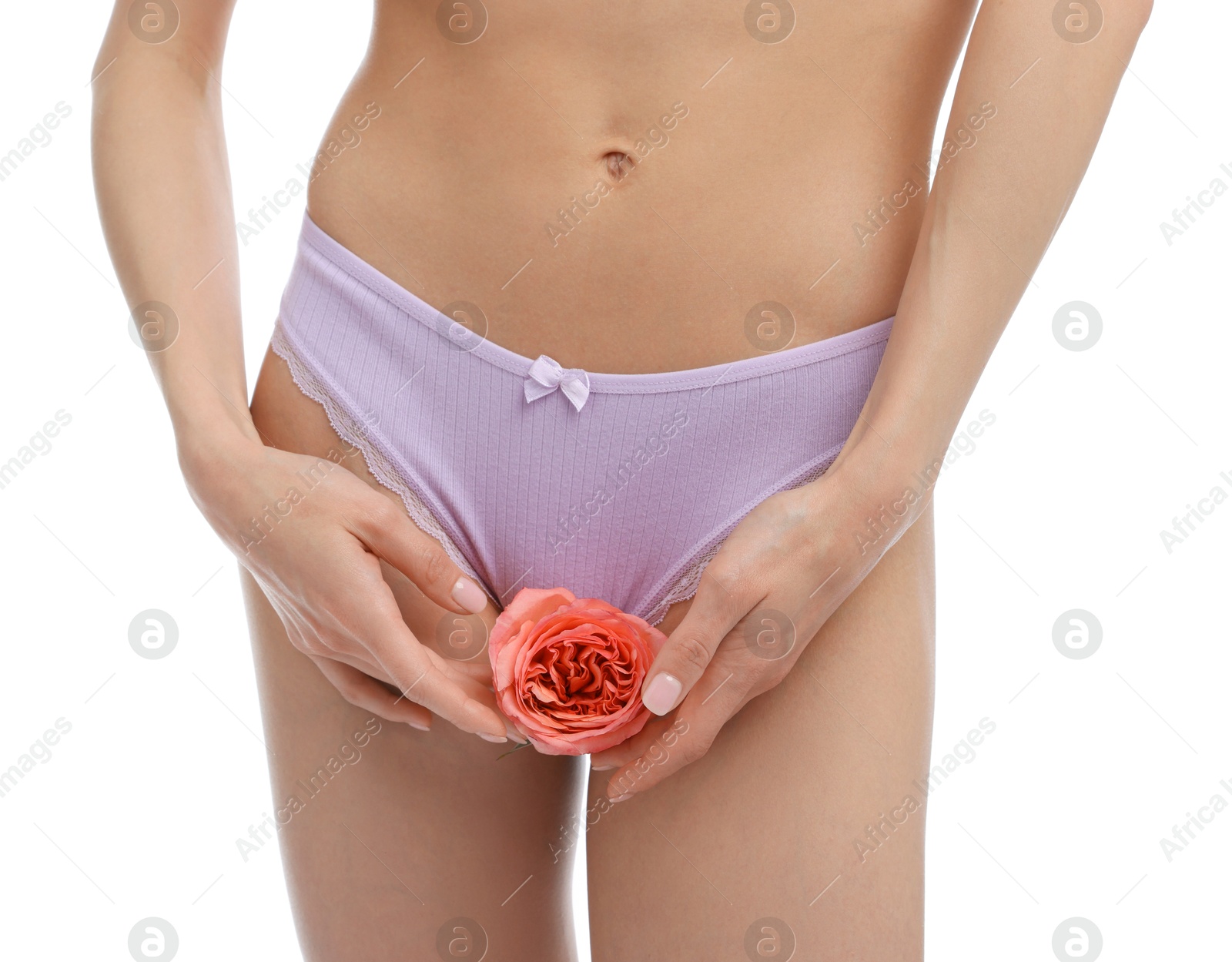 Woman with flower wearing beautiful underwear on white background, closeup Photo of Woman with flower wearing beautiful underwear on white background, closeup