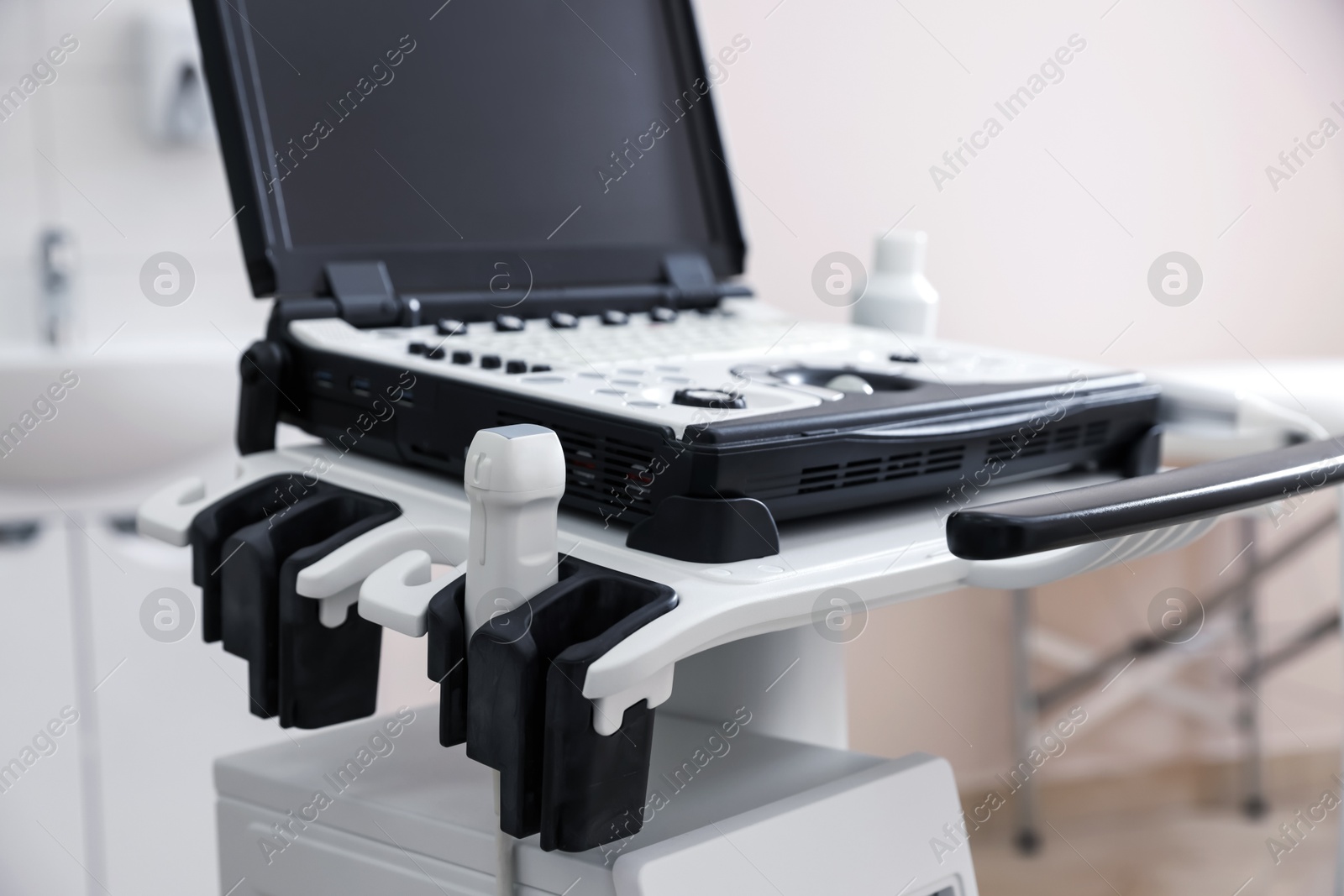Modern ultrasound machine in clinic. Medical equipment Photo of Modern ultrasound machine in clinic. Medical equipment
