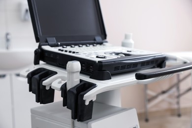 Photo of Modern ultrasound machine in clinic. Medical equipment
