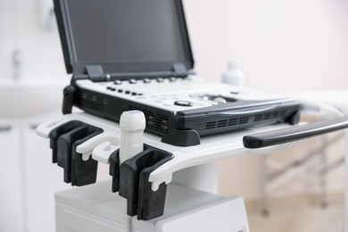 Photo of Modern ultrasound machine in clinic. Medical equipment