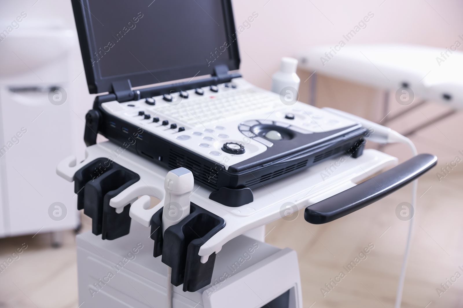 Modern ultrasound machine in clinic. Medical equipment Photo of Modern ultrasound machine in clinic. Medical equipment