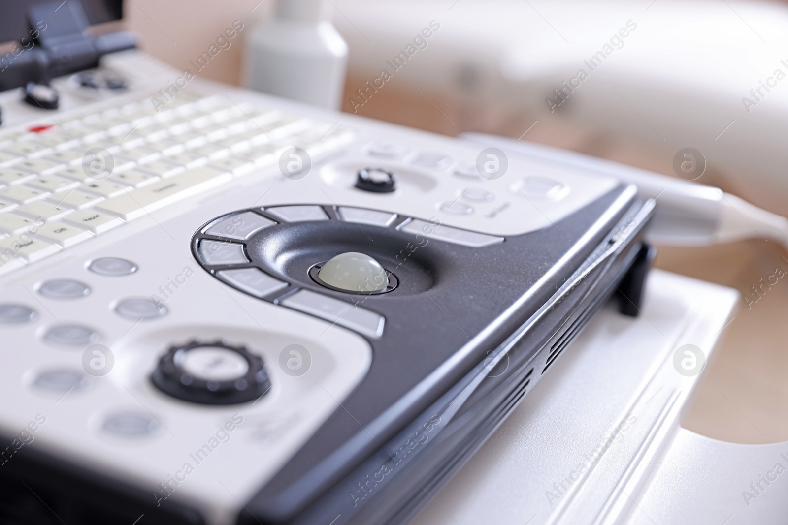 Modern ultrasound machine in clinic, closeup. Medical equipment Photo of Modern ultrasound machine in clinic, closeup. Medical equipment