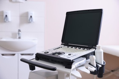 Photo of Modern ultrasound machine in clinic. Medical equipment