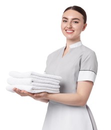 Photo of Chambermaid with stack of clean towels on white background