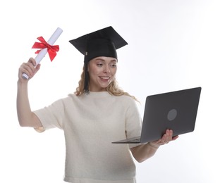 Photo of Happy student with diploma and laptop after graduation on white background