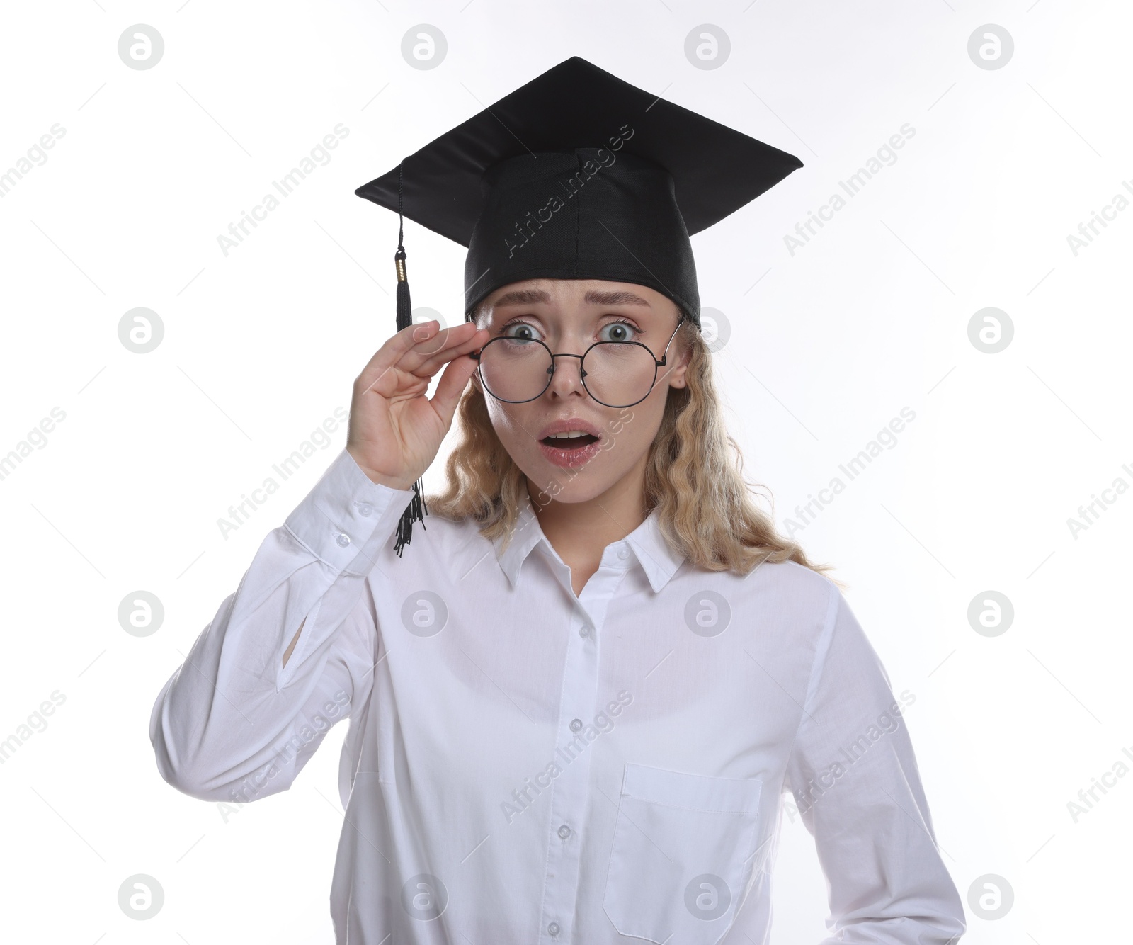 Emotional student after graduation on white background Photo of Emotional student after graduation on white background