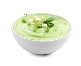 Photo of Tasty pea cream soup with croutons, basil and microgreens isolated on white