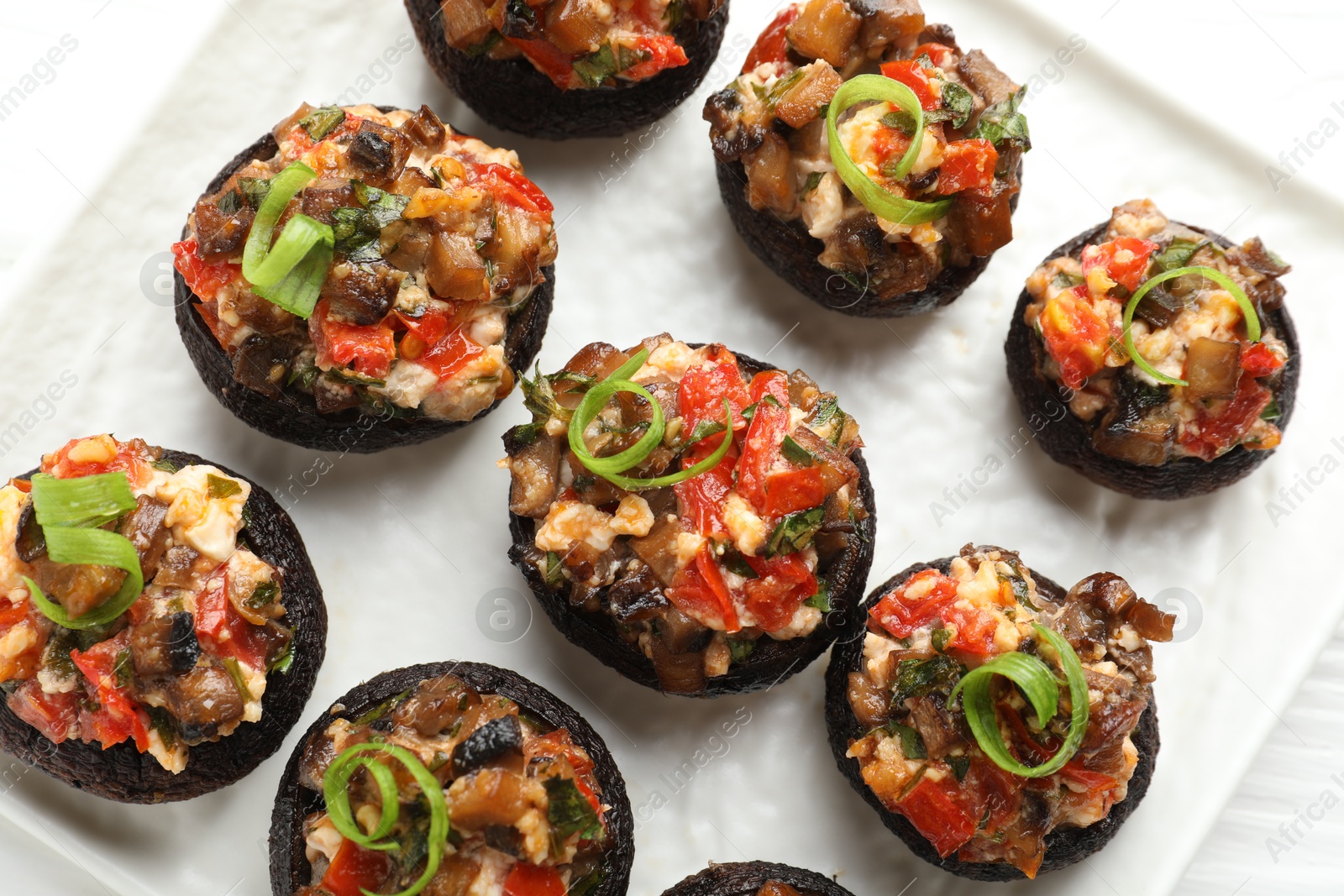 Delicious stuffed mushrooms on table, top view Photo of Delicious stuffed mushrooms on table, top view