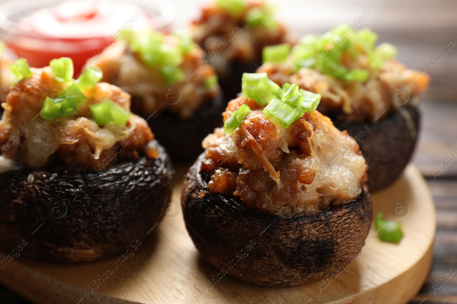 Many delicious stuffed mushrooms on table, closeup Photo of Many delicious stuffed mushrooms on table, closeup