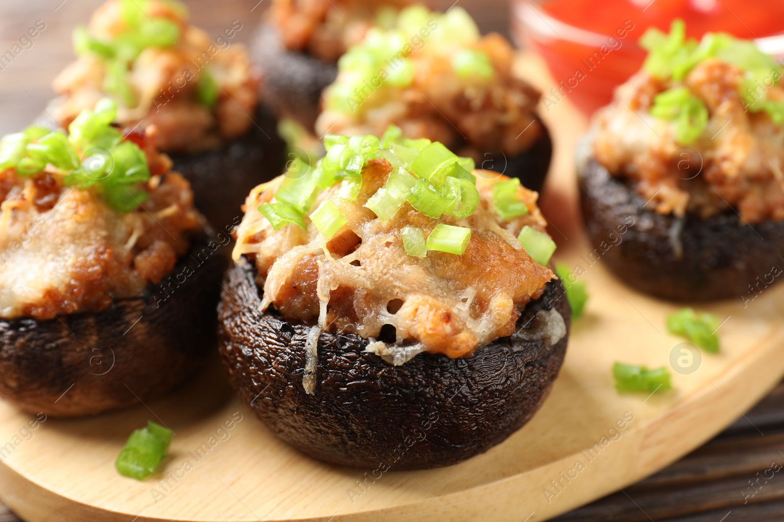 Many delicious stuffed mushrooms on table, closeup Photo of Many delicious stuffed mushrooms on table, closeup