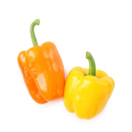 Photo of Ripe colorful bell peppers isolated on white, top view