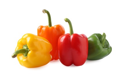 Photo of Ripe colorful bell peppers isolated on white