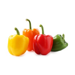 Photo of Ripe colorful bell peppers isolated on white