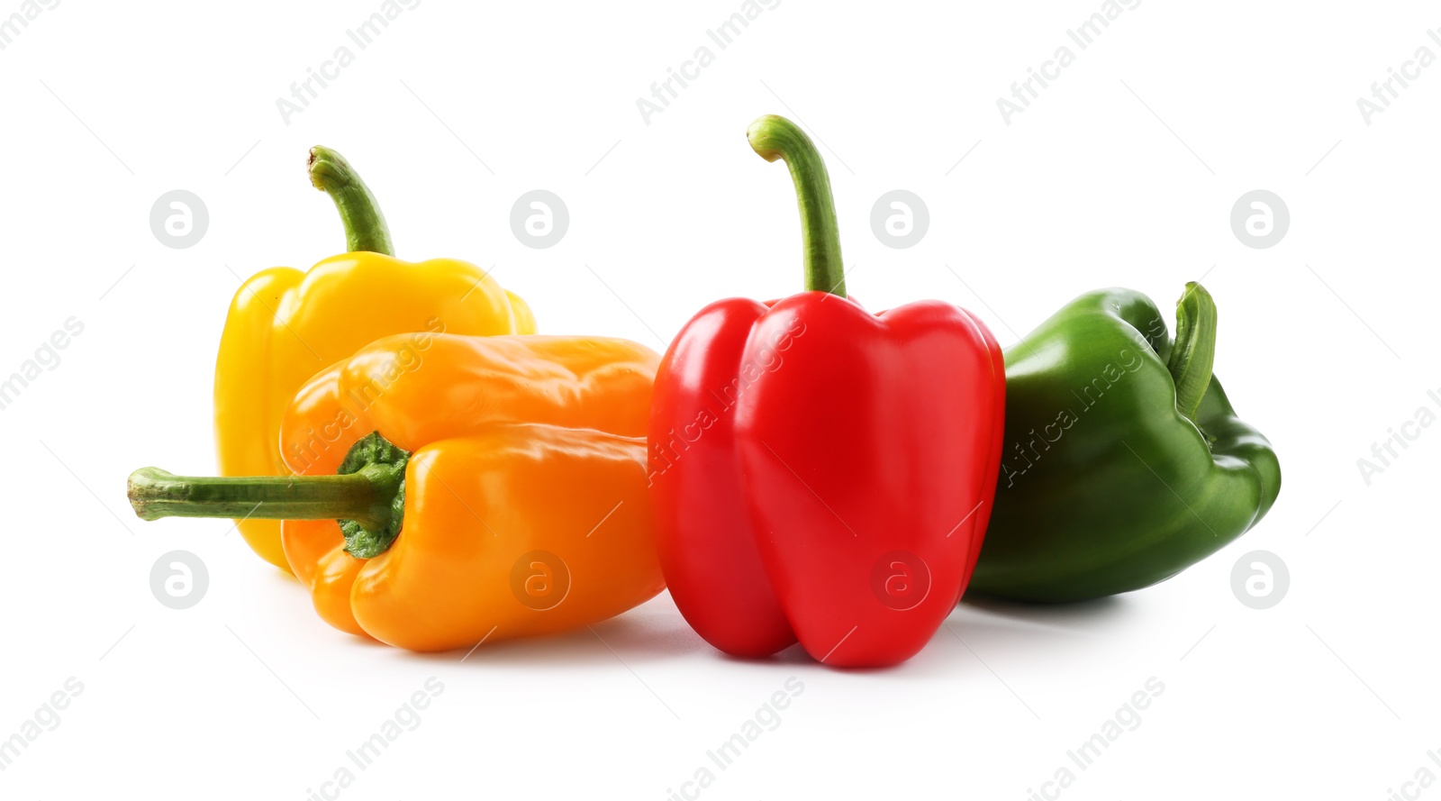 Photo of Ripe colorful bell peppers isolated on white
