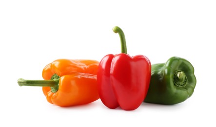 Photo of Ripe colorful bell peppers isolated on white