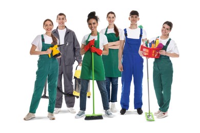 Image of Team of professional janitors with supplies on white background. Cleaning service