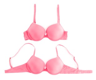 Image of Beautiful pink bra isolated on white, collage. Top view