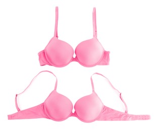 Image of Beautiful pink bra isolated on white, collage. Top view