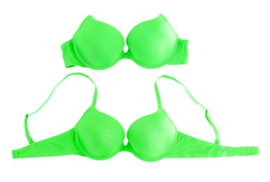Image of Beautiful light green bra isolated on white, collage. Top view