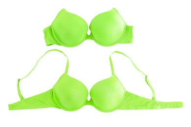 Image of Beautiful light green bra isolated on white, collage. Top view