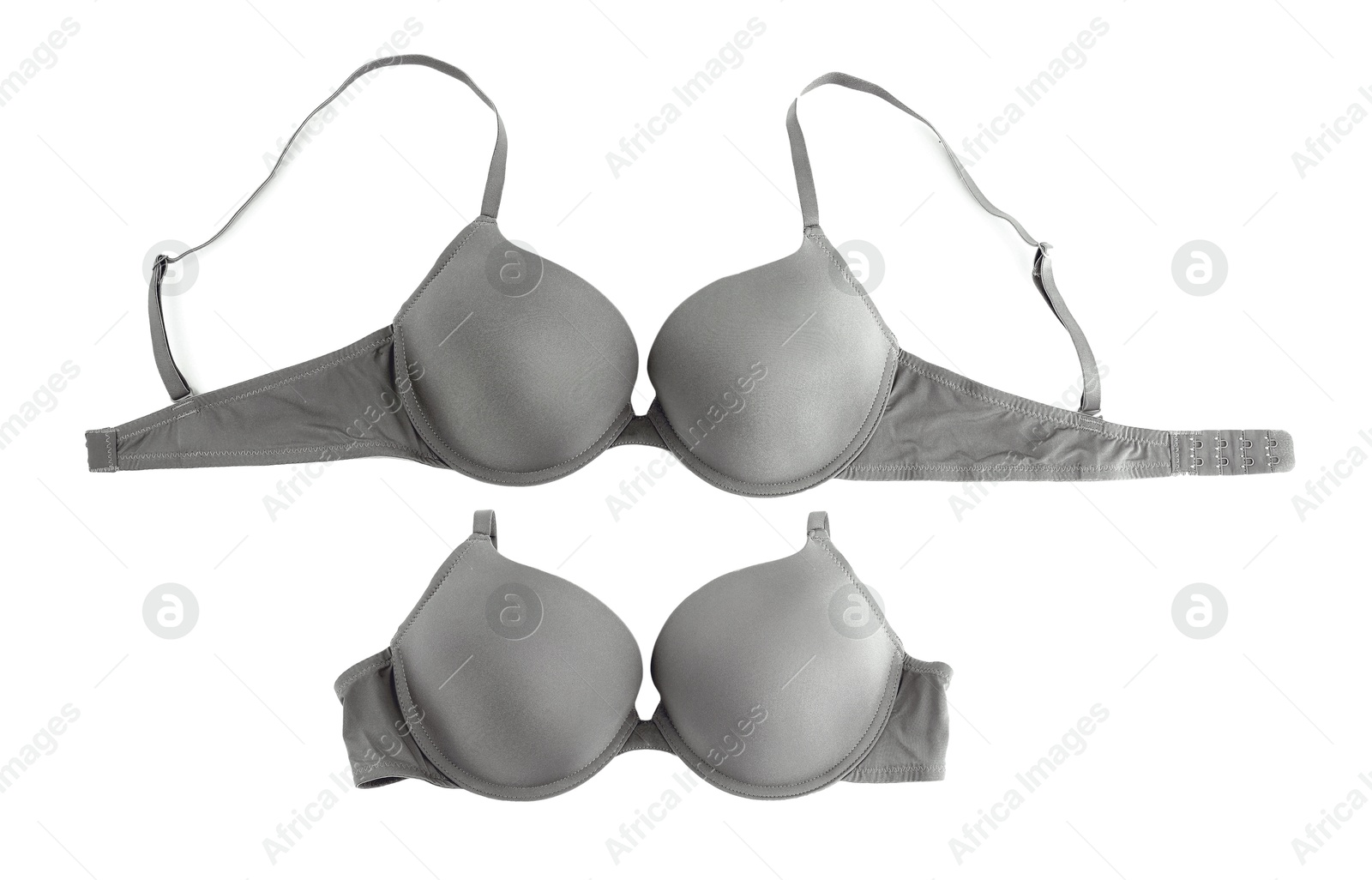 Beautiful grey bra isolated on white, collage. Top view Image of Beautiful grey bra isolated on white, collage. Top view