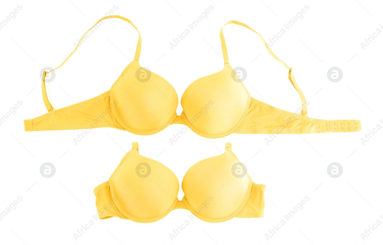 Beautiful yellow bra isolated on white, collage. Top view Image of Beautiful yellow bra isolated on white, collage. Top view