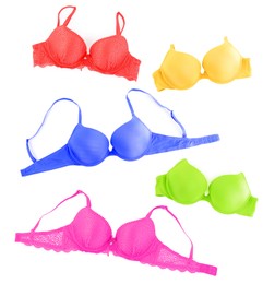 Image of Bras of different colors isolated on white, collage. Top view