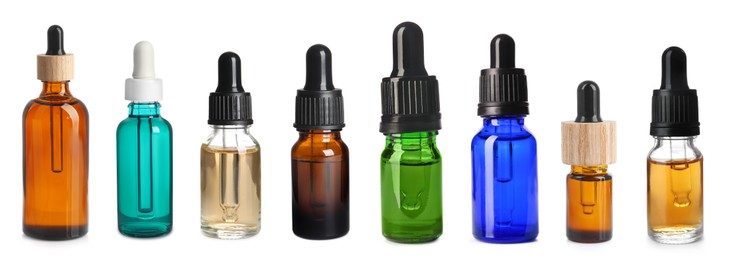 Image of Tinctures in different bottles isolated on white, set