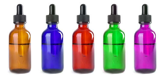 Image of Tinctures in bottles of different colors isolated on white, set