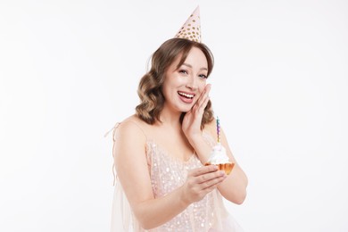 Photo of Birthday celebration. Woman with cupcake on white background