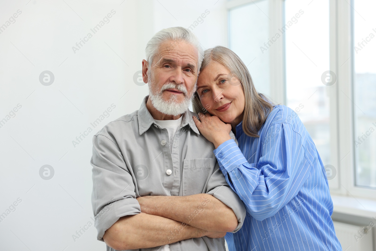 Portrait of cute couple together at home Photo of Portrait of cute couple together at home