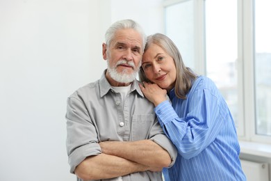 Photo of Portrait of cute couple together at home