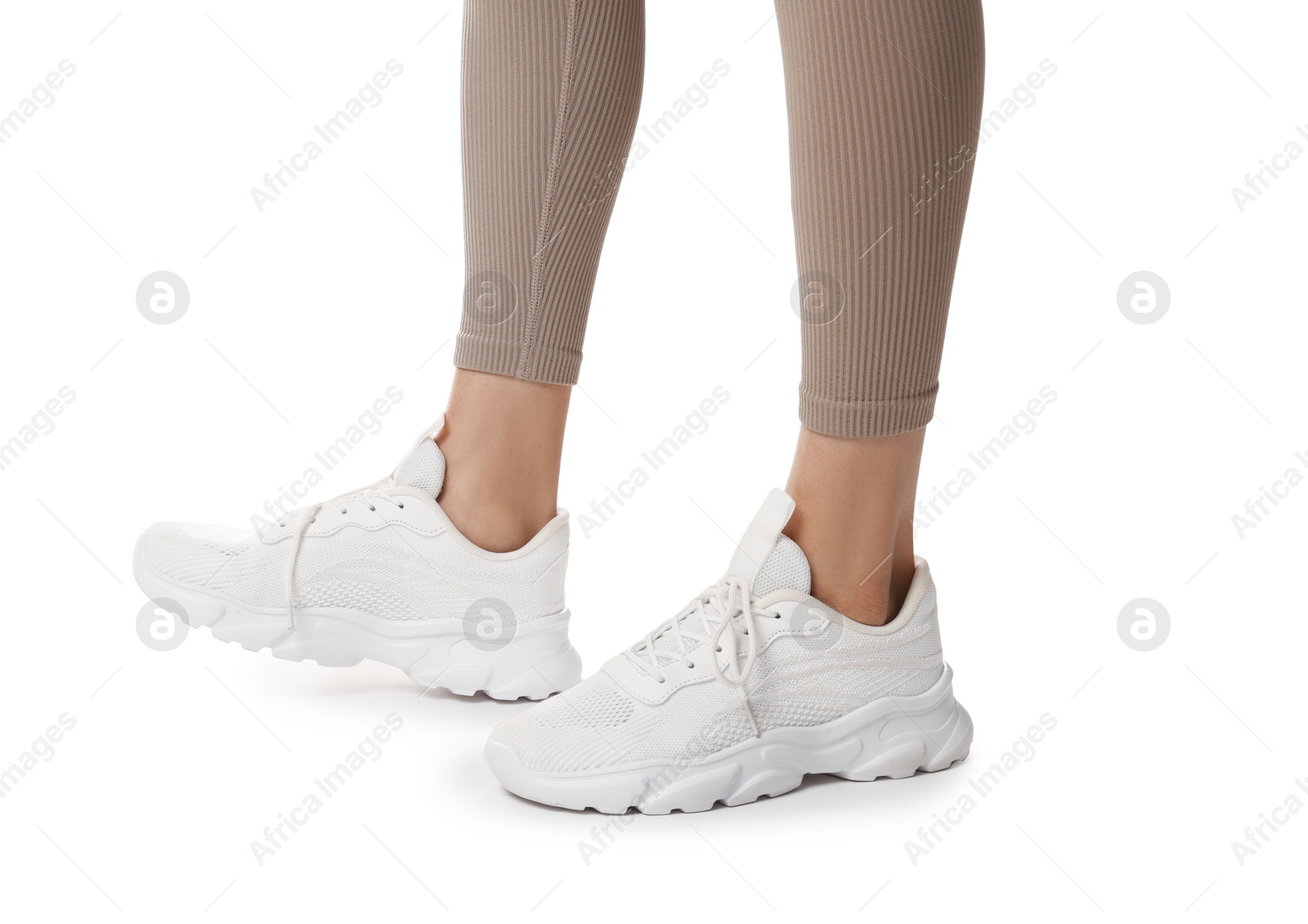 Runner in starting position on white background, closeup Photo of Runner in starting position on white background, closeup