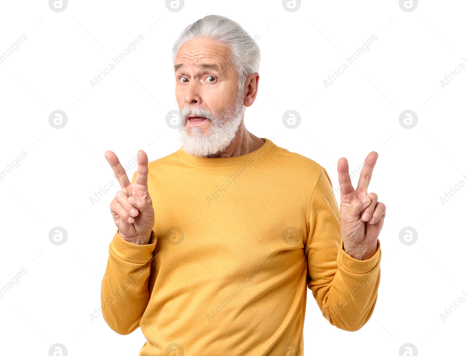 Elderly man showing v-signs on white background Photo of Elderly man showing v-signs on white background