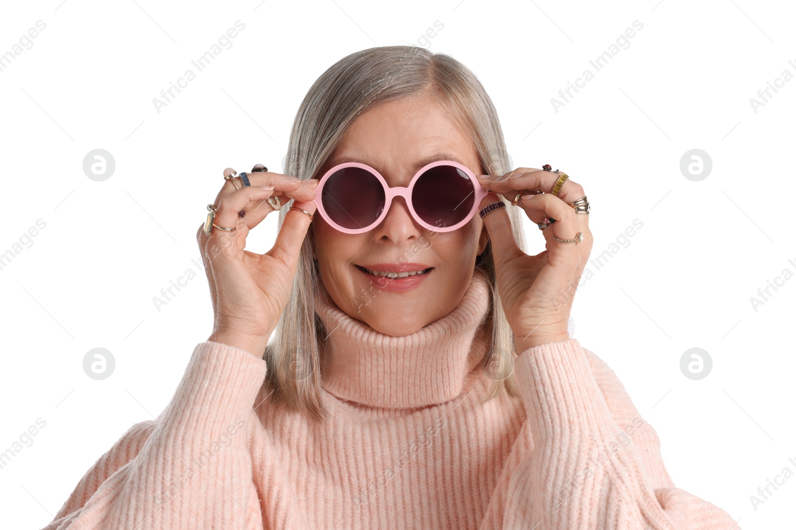 Senior woman wearing different rings and sunglasses on white background Photo of Senior woman wearing different rings and sunglasses on white background