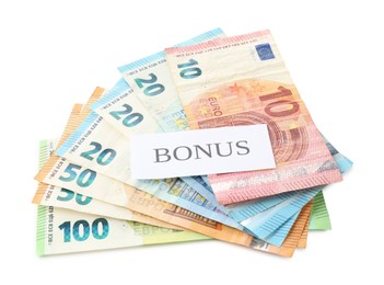 Photo of Euro banknotes and card with word Bonus isolated on white