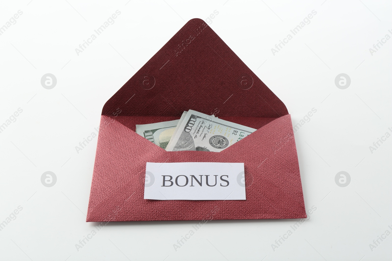 Envelope with word Bonus and dollar banknotes on white background Photo of Envelope with word Bonus and dollar banknotes on white background