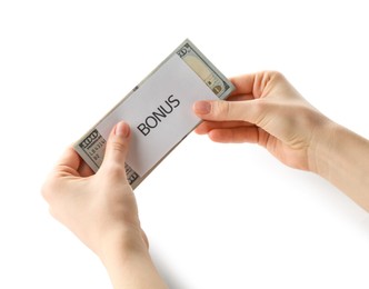 Photo of Woman holding dollar banknotes and card with word Bonus on white background, closeup