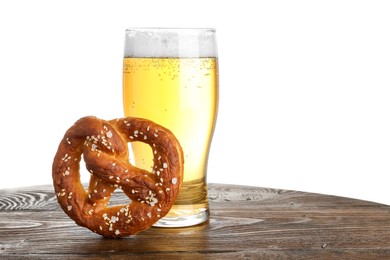 Photo of Tasty pretzel and glass of beer on wooden table against white background